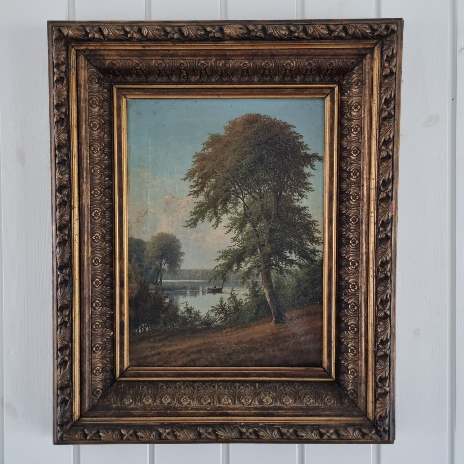 Olie på lærred - Parti med sø og lille båd - cirka 1880
