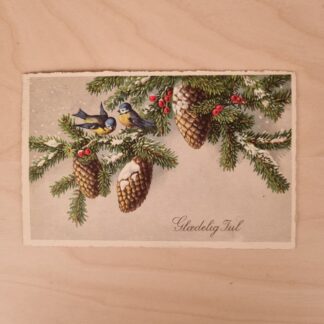 Julekort fra 1942 med blåmejser på grangrene